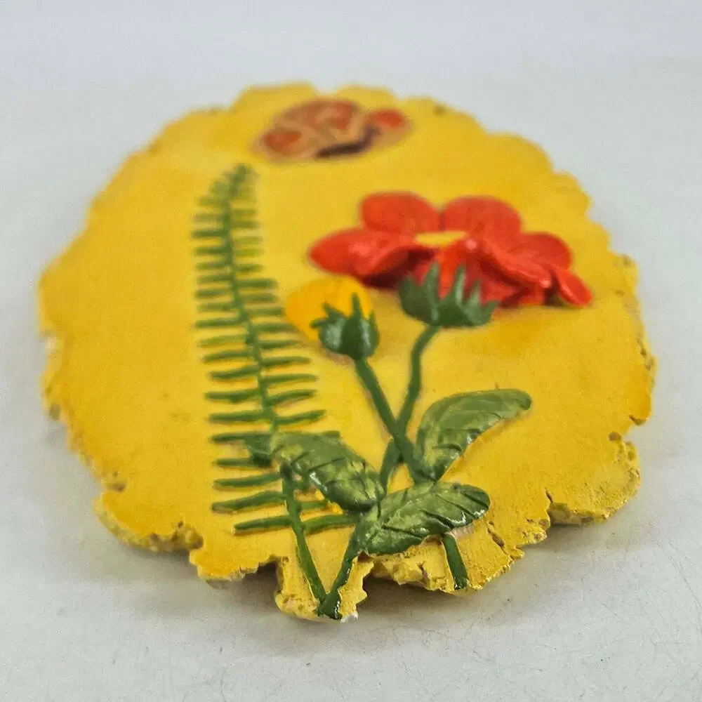 Mid Century vintage chalkware wall plaque yellow orange flower butterfly